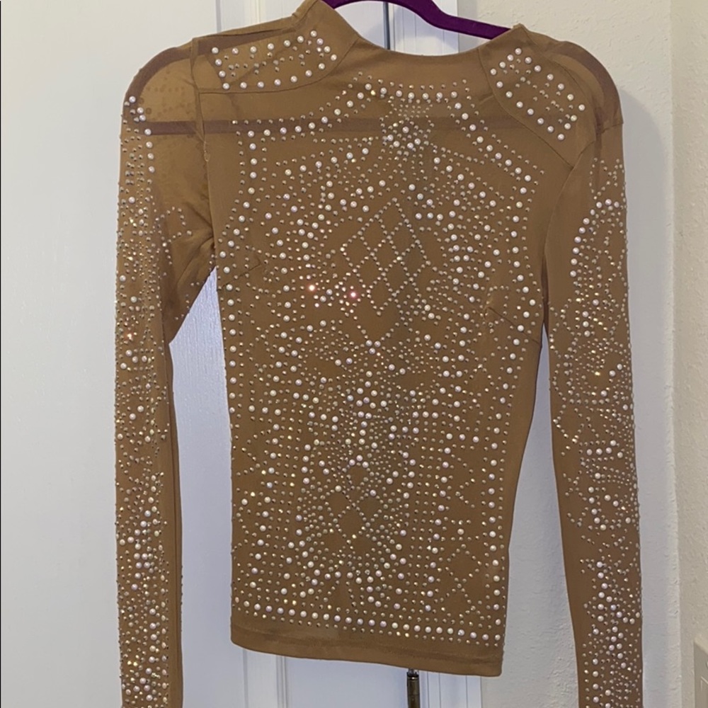 Sheer embellished top size small long sleeved